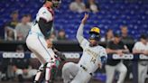 Brewers score three in eighth to rally past Marlins