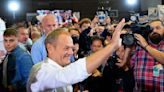 Parties running in Poland's election hold final campaign rallies as polls suggest a close race