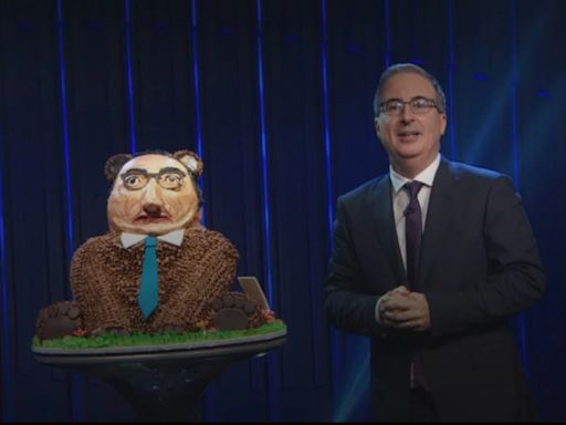 John Oliver Dives Face First Into the Butt of a John Oliver Cake Bear From New York Bakery After Challenge