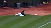 Watch A's ball boy make incredible diving stop, receive ovation