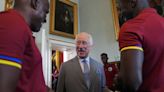 King Charles learns new handshake from West Indies cricket players