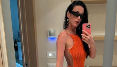 Katy Perry Looks Like an Alien on the Beach Wearing Iridescent Rubber Rings as a swimsuit
