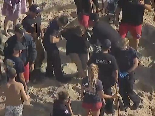 16-year-old rescued after sand hole collapses on beach