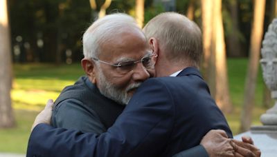 Modi under fire for bear-hugging ‘mass murderer’ Putin during Moscow summit