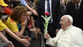 A better world can't be built 'lying on the couch,' pope tells children