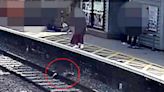 WATCH: 3-year-old boy saved from railway line seconds before train thunders past