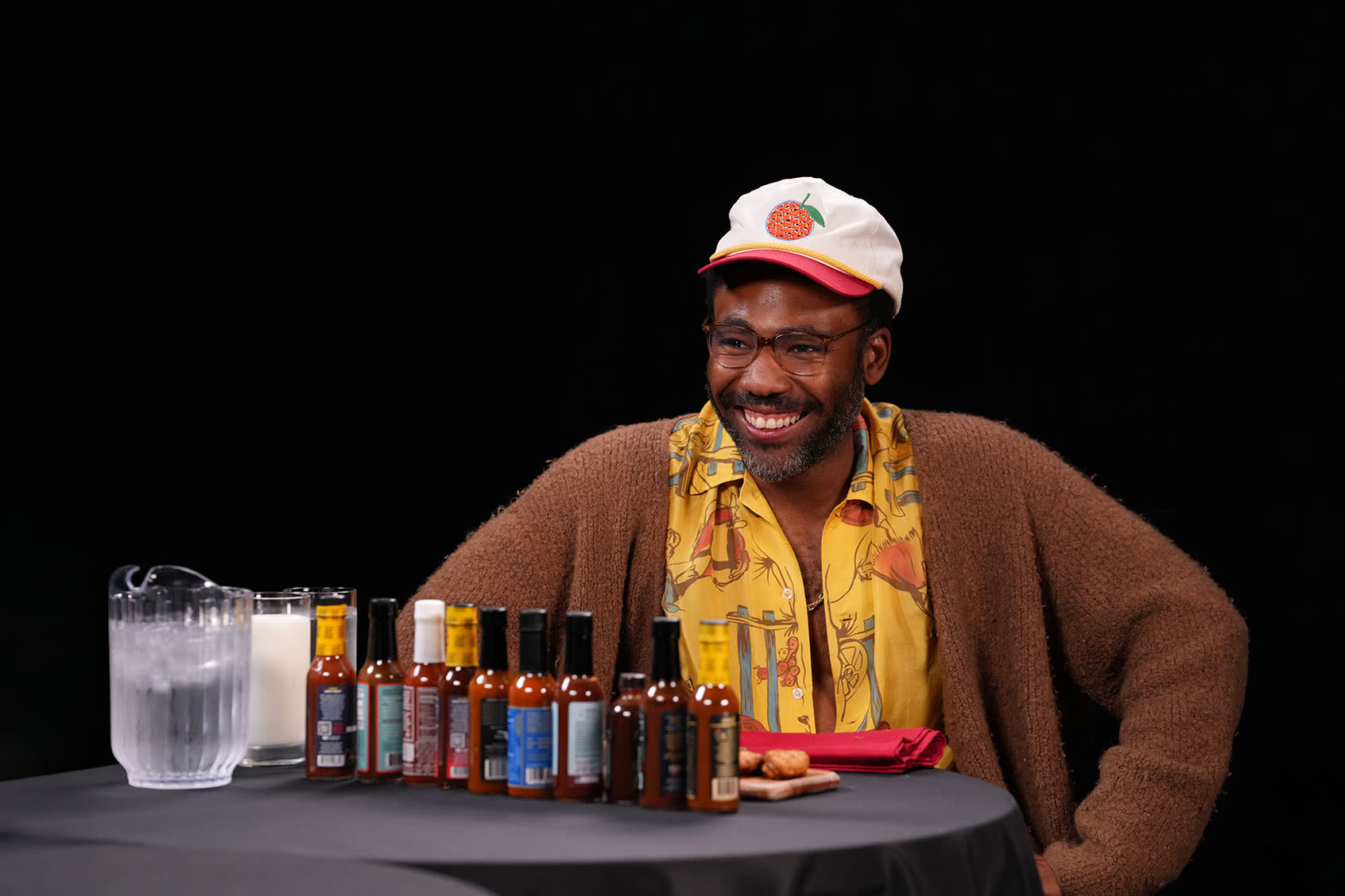 “Hot Ones”: Donald Glover bids adieu to Childish Gambino moniker while feasting on spicy wings