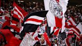 Ajax ban supporters from carrying signs asking players for their shirts at matches