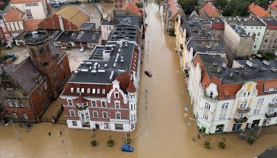 Entire city evacuated after floods, 7 die in wildfires as extreme weather sweeps Europe