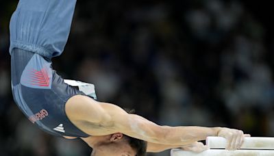 Great Britain rides strong effort of Olympic veterans to early lead in men's gymnastics qualifying