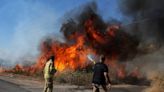 Hezbollah launches barrage of rockets at Israel after top commander killed