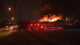 Fire crews battle blaze at business founded by former Cleveland Browns football player