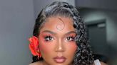 Lizzo Nailed Spring Beauty at the 2023 Grammys With Rosette Bangs and Peachy Blush