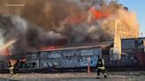 Crews battling 4-alarm fire at Oakland lumber yard