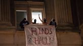 Columbia University threatens to expel student protesters occupying an administration building