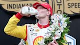 Newgarden wins storm-delayed Indy 500 on final lap