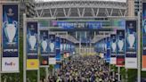 Fans rush Wembley Stadium ahead of Champions League final despite ring of steel