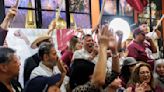 Mexican nationals in Chicago celebrate first woman president after some waited hours to vote