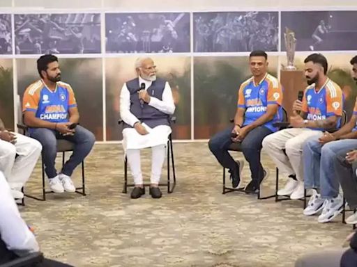 In Pics: PM Narendra Modi's chat session with Rohit Sharma, Virat Kohli and co - Champions with PM Modi