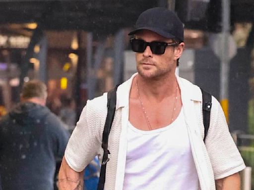 Chris Hemsworth cuts casual figure at Sydney Airport