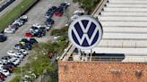 Volkswagen expects slower sales growth as economic outlook dims