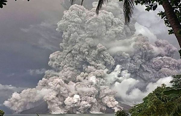 Indonesia’s Ruang volcano spits more hot ash after eruption forces schools and airports to close