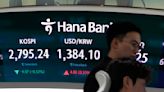 Stock market today: Asian shares are mixed after gains on Wall Street