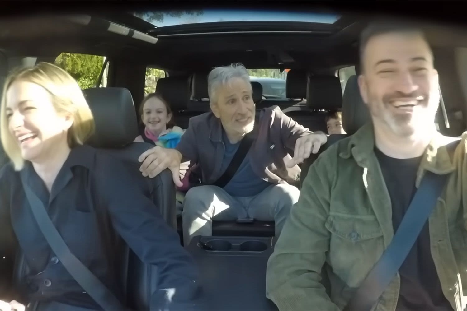 Jon Stewart surprises Jimmy Kimmel's kids on drive to school, sings along to Olivia Rodrigo