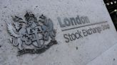 London stocks open lower as commodity stocks drag, Tesco up on forecast lift