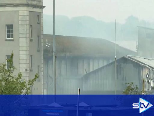 Firefighters battle blaze at abandoned paper mill