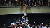 Argentina players abandon World Cup parade after fan jumps into open-top bus