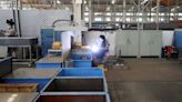 China's factory activity extends declines as heat, COVID hit output