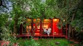 A Bright-Red Tiny Home Blossoms Outside of Warsaw