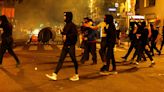 Shops boarded up amid fears of left-wing riots after French election