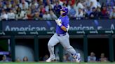 World champion Rangers overcome disputed tip and beat Cubs 4-3 on Heim’s 10th-inning single