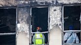 New Zealand police lower hostel fire death toll to 5; man held in jail on arson charges