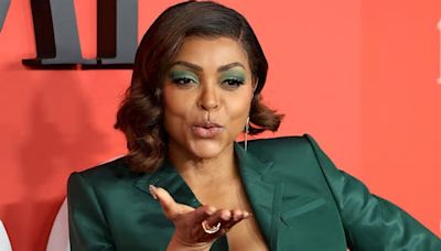 Taraji P. Henson the busty bombshell blows a kiss on red carpet at star-studded Time 100 Gala