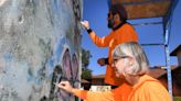 Artists restore Berlin Wall segment at Reagan library in Simi Valley