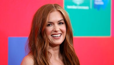 Isla Fisher's rare photo with kids and mystery companion gets fans talking