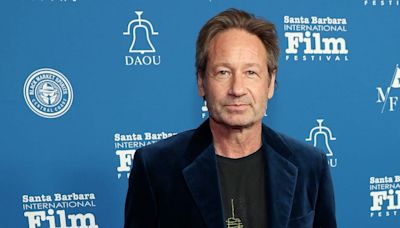 David Duchovny says a director used a megaphone to tell him when to orgasm during his first sex scene in 1991