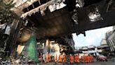 26 bodies found as search ends at Cambodian hotel fire site