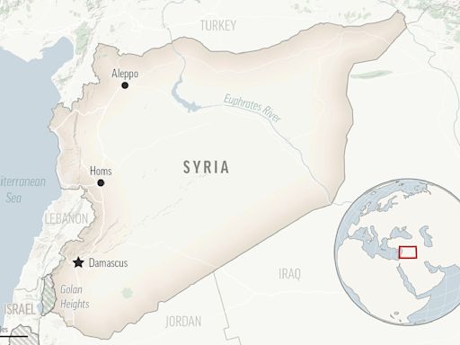 A suspected Islamic State group attack on pro-government force in east Syria kills at least 13