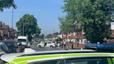 Child, 1, rushed to hospital after police flagged down on street