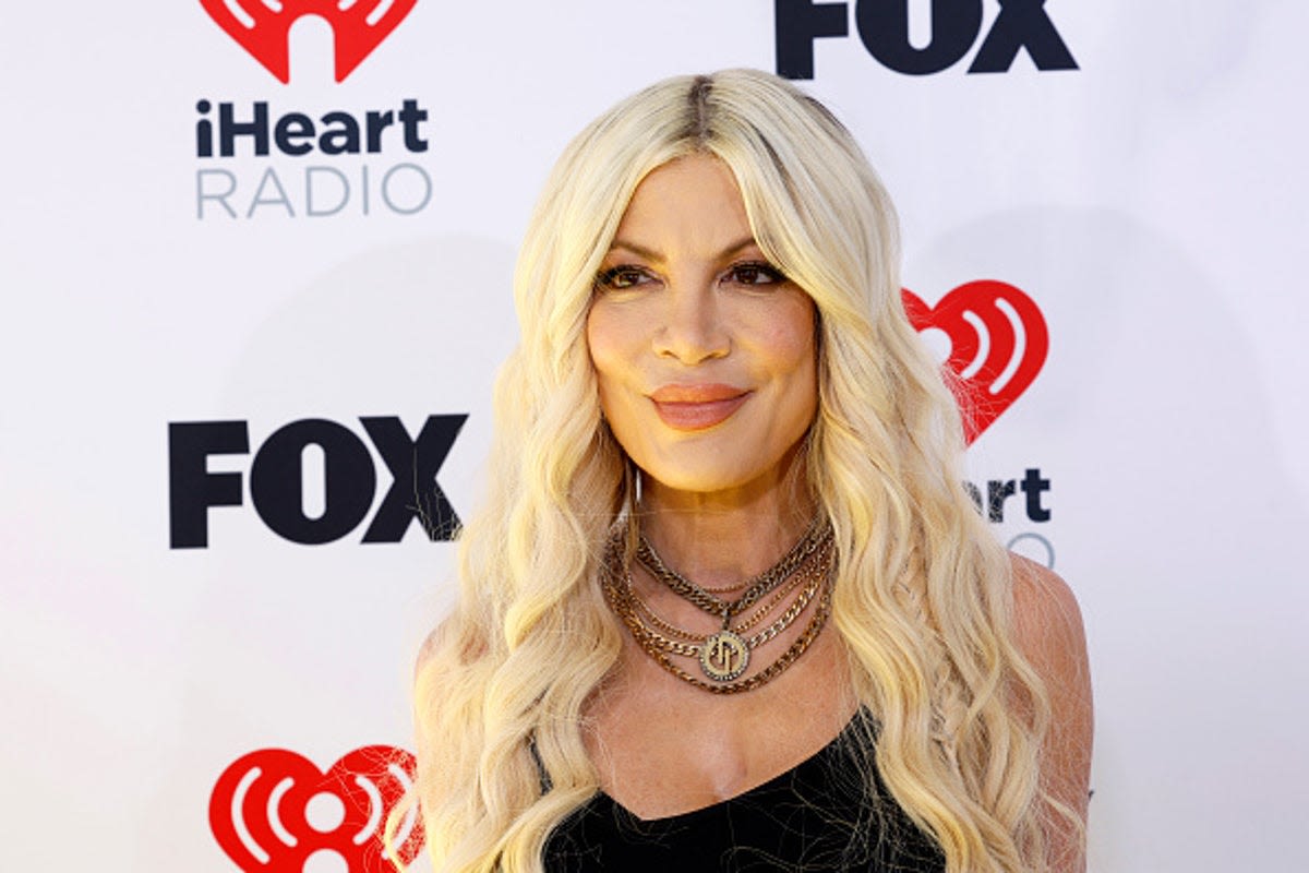 Tori Spelling shares the story of her first breast augmentation: ‘I can’t make this up’