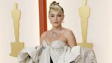 Florence Pugh Looks Like a Bona Fide Movie Star in Shorts and a Cape at the 2023 Oscars