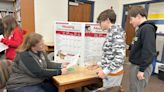 McPherson Middle School students get a dose of real-life money issues