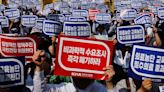 South Korea drops plan to suspend licenses of striking doctors