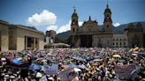 Thousands march in Colombia to protest government reforms