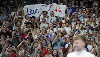 Longtime Phelps coach Bob Bowman was in tears watching new star pupil Léon Marchand win gold