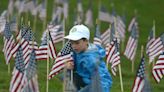 Remembering those who served: Thousands of flags placed on vets' graves